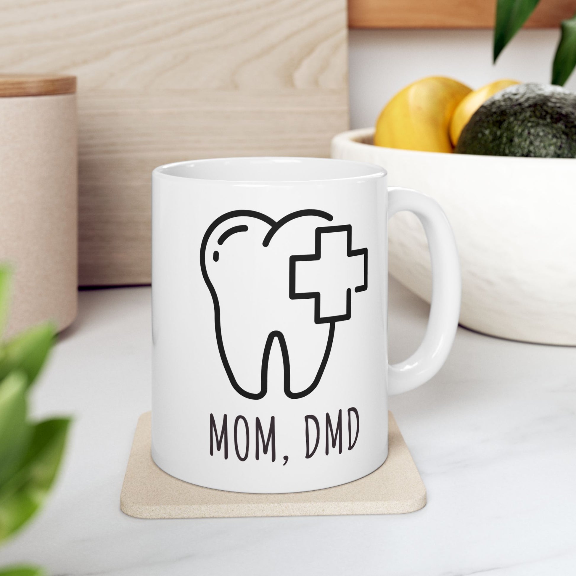 White coffee mug with dental-themed design for mom dentists and DMD mothers.