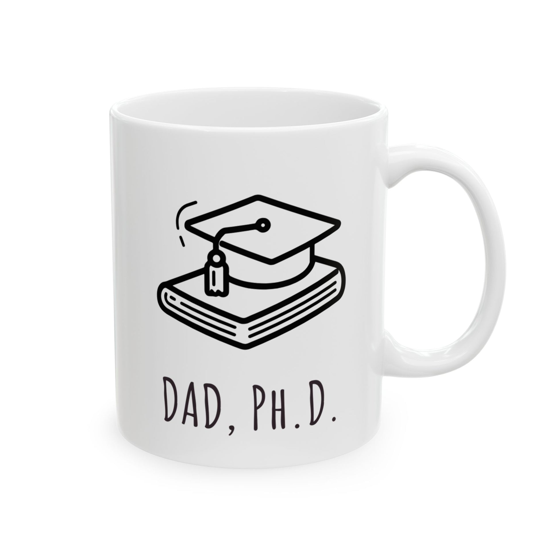 White mug with a graduation cap and books design and 'DAD, PH.D.' text on a white background
