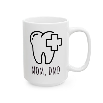 White mug with a tooth and cross design, labeled 'Mom, DMD', on a white background for dentists.